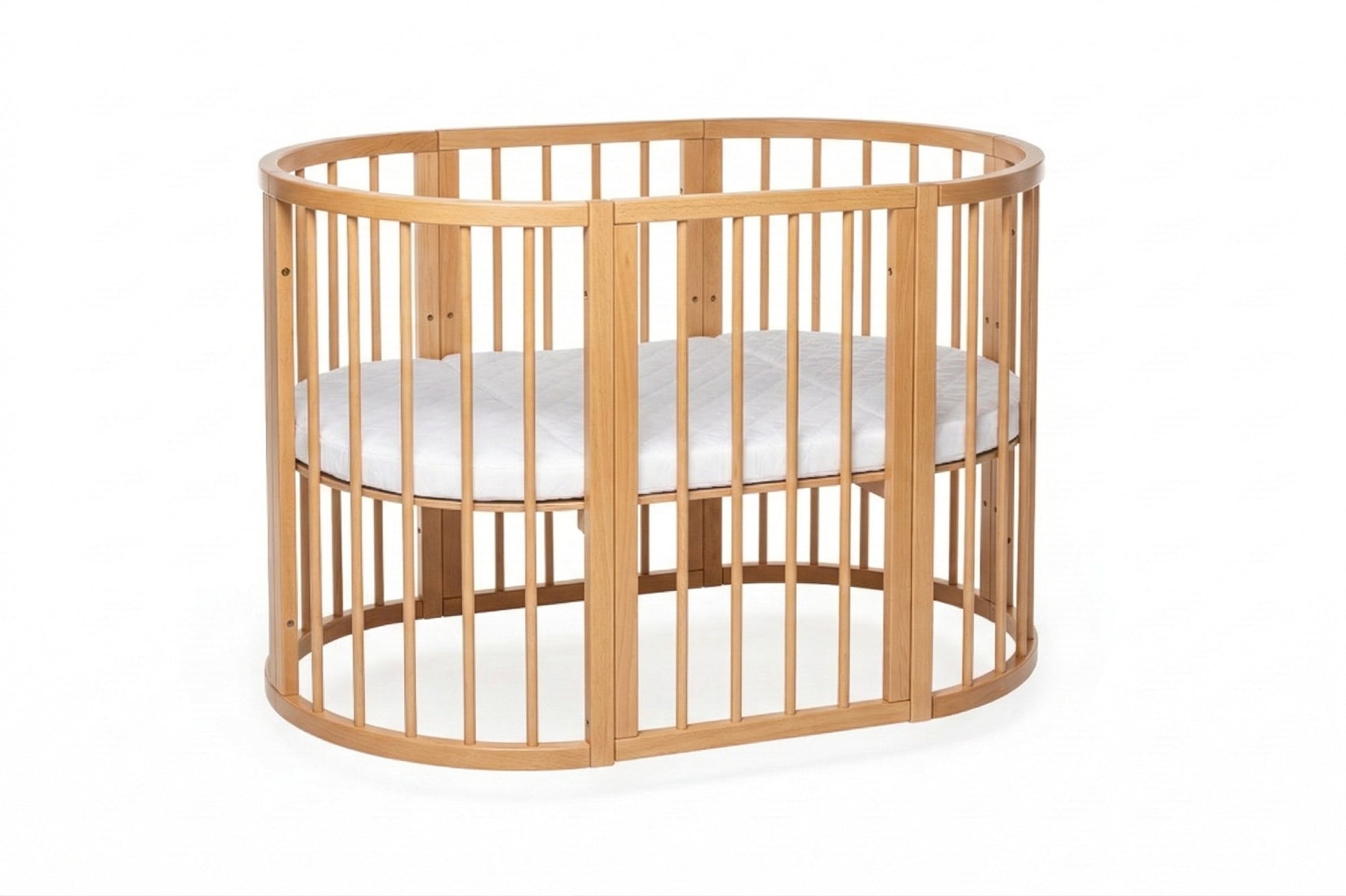 Round beech crib with one removable side open to function as bedside sleeper