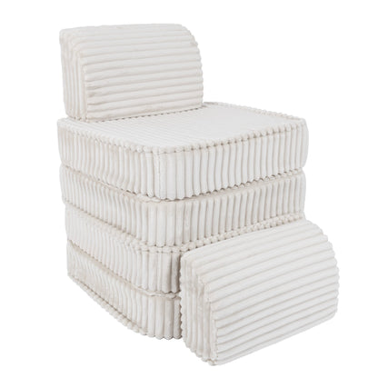 Disassembled white modular sofa pieces stacked showing individual cushion modules and back support