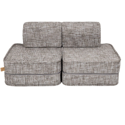 Front view of modular kids sofa with four cushions and two backrest pieces in moon grey
