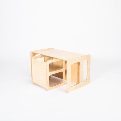 White Montessori weaning table and single chair with storage for toys