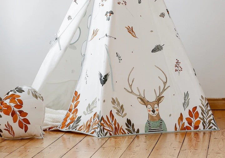 Interior view of cotton teepee showing forest pattern floor and open entrance