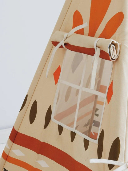 Close-up of teepee tent door opening showing white canvas ties and detailed tribal pattern on fabric