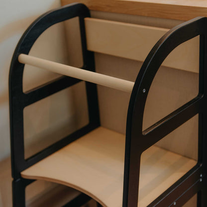 Close-up of grey kitchen tower interior showing wooden crossbar and rounded edges