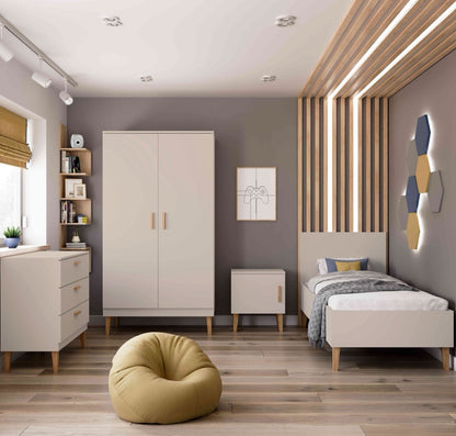 Cashmere Kubi wardrobe styled in modern children's bedroom with bed, desk, and minimalist Scandinavian decor