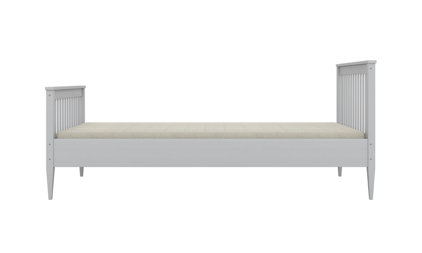 Gray Emilia toddler bed side profile showing low frame and spindle headboard