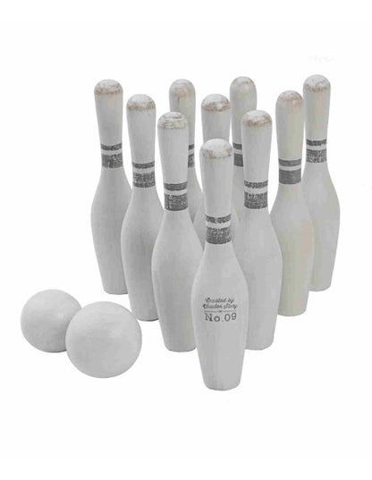 Wooden Story vintage bowling set with 10 white pins and 2 balls displayed